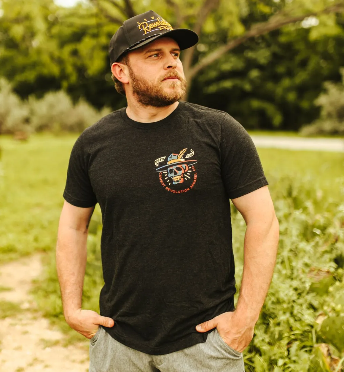 "Heavy Is The Head" Cowboy Revolution Short Sleeve Tri-Blend Tee